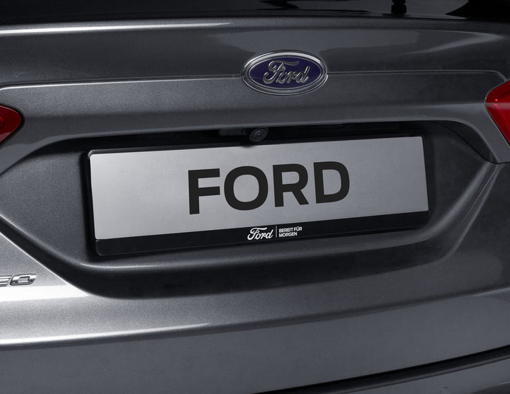 Original Ford Kennzeichenhalter schwarz „BEREIT FÜR MORGEN“, Ford-Emblem weiß